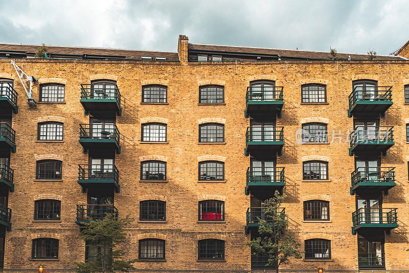 Brick building with windows, background